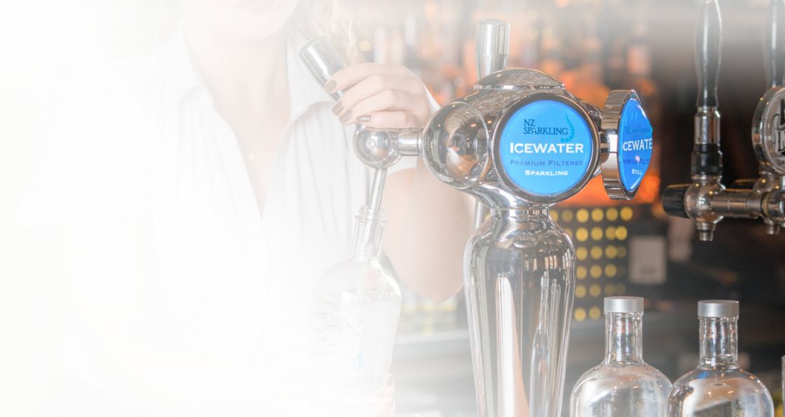 Dispensing water into bottle